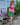 Woman in pink heart rashie with green skirt