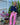 Woman wearing AMOUR rashguard with pink and red long pants